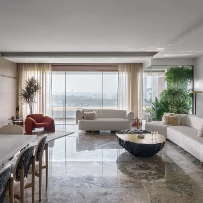 Natural light is one of my favorite materials. In this award-winning Mumbai apartment, I created an all-white living space that feels both serene and expansive, with clean lines and an open layout that draws the outdoors in.