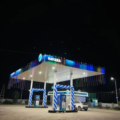 Our decoration services are not just for parties; we also handle corporate and commercial events. We decorated this new Nayara petrol pump for its grand opening, using brand-colored balloon arches and lighting to attract customers.