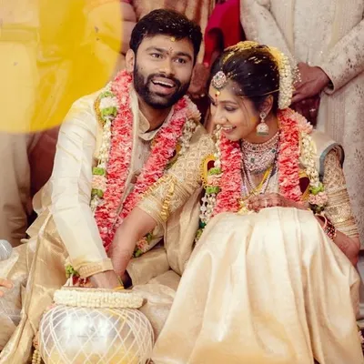 For this lovely couple's wedding ceremony, I designed coordinated outfits in classic cream and gold Kanjivaram silk. The goal was to create a timeless and elegant look that symbolized their new beginning together.