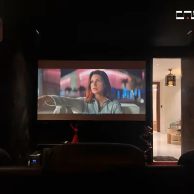 A glimpse into the B1 Paschim Vihar home theater during movie night. The large screen and professionally designed acoustics create an authentic cinematic experience right at home.