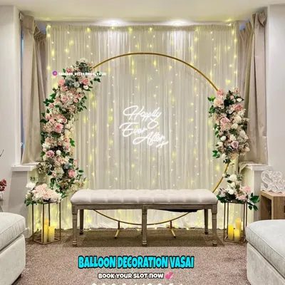 This popular golden ring arch is a favorite for engagement parties. We adorn it with soft florals and a custom neon sign to create a fairytale backdrop for your photos.