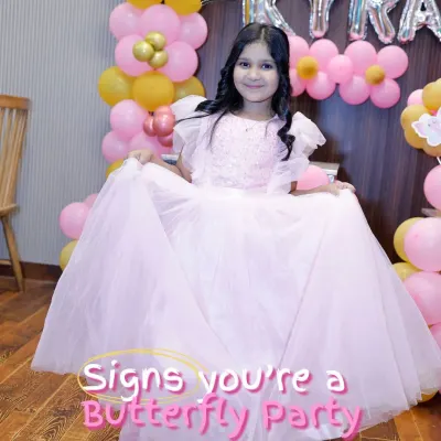 The birthday girl feeling like a princess at her butterfly-themed party. The right theme and a pretty dress can create the most magical photos.