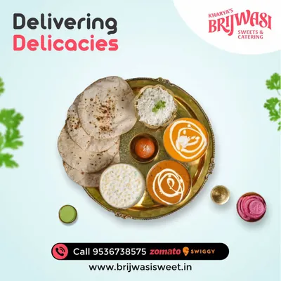 Delivering delicacies right to you. My vegetarian thali is a complete meal, featuring soft rotis, rice, two different curries, raita, and a gulab jamun for dessert.