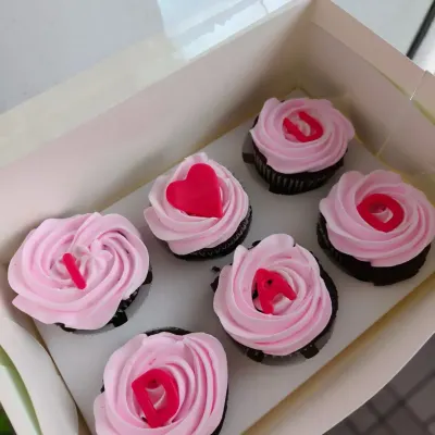 My "I ❤️ DAD" cupcakes are a popular Father's Day gift. This box of six chocolate cupcakes is topped with pink frosting and the special message spelled out.