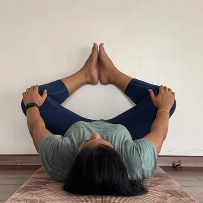 Sitting for long hours can tighten the hips and weaken the lower back. This reclined hip opener is a simple way to restore mobility and find relief.