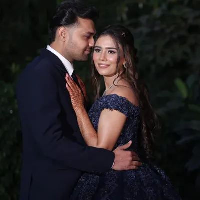 A beautiful couple portrait from an engagement shoot. I created a soft, romantic makeup look for her that looks incredible in photos and complements her stunning blue gown.