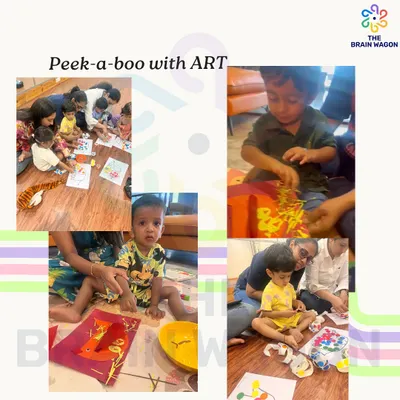 Peek-a-boo with art. Our sessions are filled with creative projects that allow children to explore materials, colors, and their own imagination.
