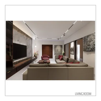 The living room in our Modern Royale project combines a comfortable sectional sofa with rich textures and artwork. We used track lighting to create a flexible, gallery-like feel, highlighting specific features and creating a layered ambiance.