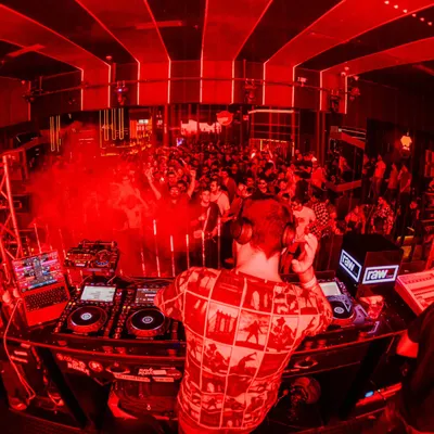 When I'm on the decks, I'm there to create a scene. This shot from behind the console captures the explosive energy I love to see. Main hega na bomb!