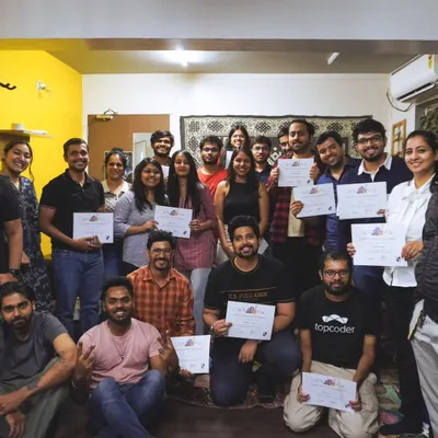 The proud participants of our music workshop for Google employees, holding their certificates of completion.