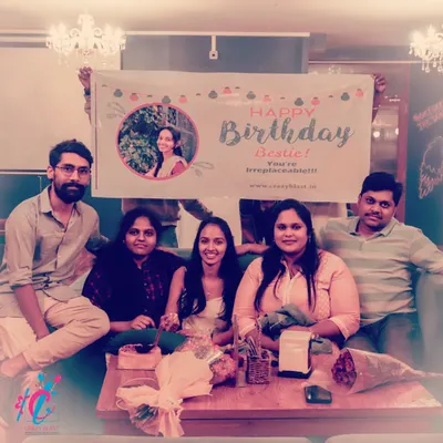Surprising your bestie is our favorite thing to do. This happy group shot was taken right after we ambushed their friend with a birthday flashmob, complete with flowers and a personalized banner.