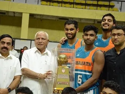 With my team and former CM B.S. Yediyurappa, holding the M C Srinivasa memorial trophy after our State 'B' Division win.