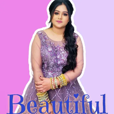 A beautiful client ready for a party in a lavender gown. The makeup is soft and pretty, with a focus on glowing skin and a simple, elegant hairstyle.