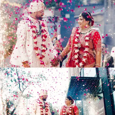 A truly grand exit for the newlyweds. This collage captures the moment Nidhi and Yash walk hand-in-hand after their ceremony, showered with rose petals and surrounded by celebratory sparklers. A perfect end to a beautiful Jain wedding ceremony.