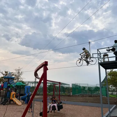 This is my unique zip-cycling activity. You get to ride a bicycle on a wire suspended high in the air, a true test of balance and courage.
