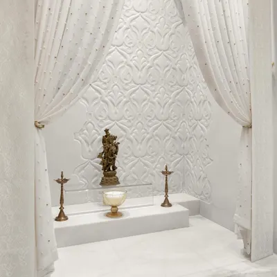 A sanctuary of serenity and faith. Adorned with delicate carvings and draped in billowing white curtains, this sacred space exudes a sense of calm. It’s a haven where worries dissolve and peace reigns supreme.