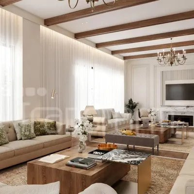 I designed this living space with a wooden beam ceiling and soft neutral tones to exude warmth and sophistication. The grand chandeliers and classic marble fireplace anchor the room, creating a perfect blend of luxury and comfort for gatherings.