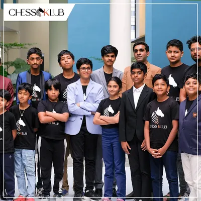 Our team of budding champions. This is the next generation of strategic thinkers, united by their love for chess and their matching ChessKlub shirts. We are more than a class; we are a team.