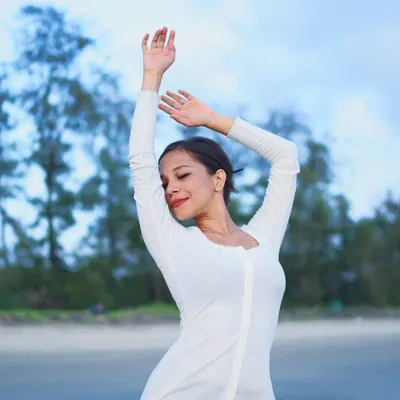A serene portrait taken on the beach in Goa. These moments of calm and connection with nature inspire much of my creative work.