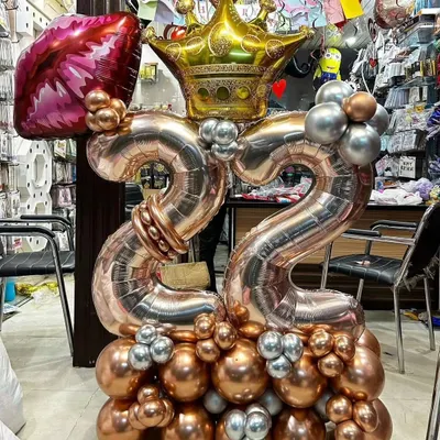 A stylish rose gold and silver balloon bouquet for a 22nd birthday. This is a great option for a gift or a smaller celebration.