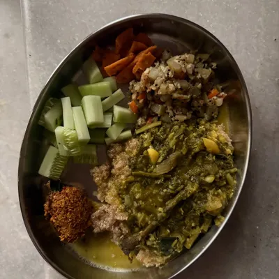 A typical `oota` plate from my kitchen, featuring quinoa, soppina huli, and various vegetable preparations. This shows how a traditional meal can be packed with diverse nutrients.