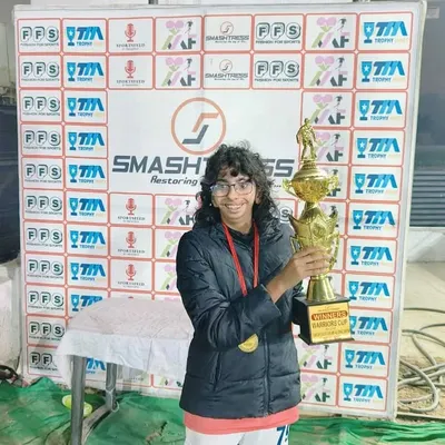 YDFA's girl power! One of our talented players proudly holds the winner's trophy. She played with skill, strength, and determination.
