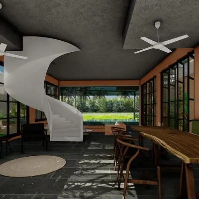 The dining and living area of the Corgao villa concept, featuring a striking white spiral staircase that acts as a functional sculpture. The space is lined with large windows, ensuring that the lush green exterior is a constant backdrop to daily life.