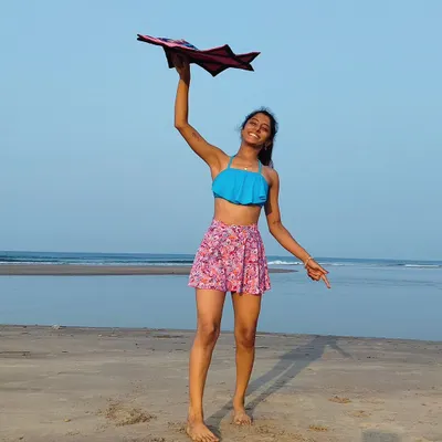 Spinning my dapo star at the beach in Goa. Dapo is a type of spinning cloth that is so much fun to play with, especially with the ocean breeze.