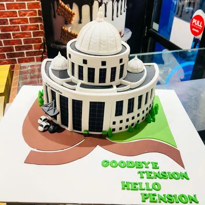 A memorable retirement cake designed as a detailed replica of the Navi Mumbai Municipal Corporation headquarters. This is one of my popular "Goodbye Tension, Hello Pension" cakes, customized for a special farewell.