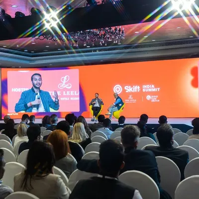 A wide-angle view of the Skift India Summit, showcasing the impressive stage setup and large audience. This type of event photography is crucial for highlighting the scale and success of your conference.