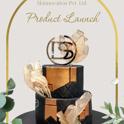 We were commissioned to create this statement cake for the Skinnovation Pvt. Ltd. product launch. The two-tier design features a modern black and gold theme, complete with a custom acrylic logo topper for prominent branding.