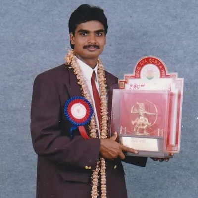 Holding the Arjuna Award, a symbol of my contribution to Kabaddi. This recognition fuels my passion to give back to the sport and mentor coaches who will continue this legacy of excellence.