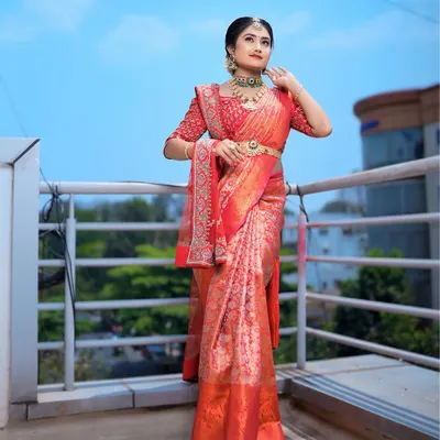 A full-length view of the traditional South Indian bridal look. I draped the rich Kanjeevaram saree and styled it with temple jewellery to create an authentic and regal appearance for the wedding ceremony.