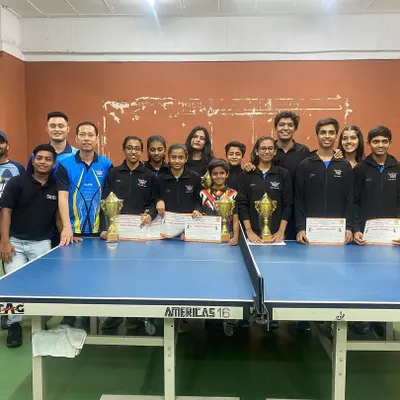 A clean sweep by our academy at the State Ranking Tournament. This group photo showcases the depth of our talent, with players holding trophies and certificates from their victories across multiple age categories.