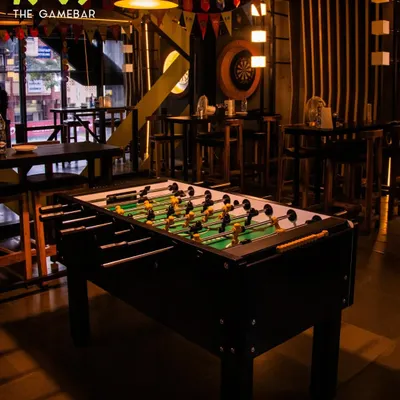 Our foosball table is always ready for action. It's a central part of our bar's energetic atmosphere, perfect for a quick game or a full-blown tournament with your friends.