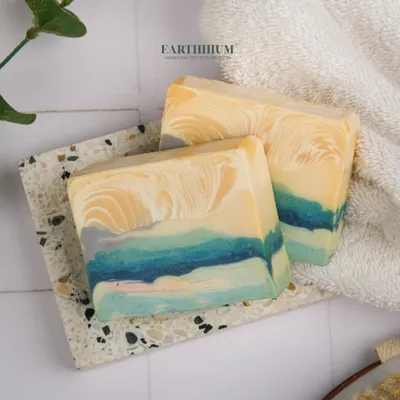 This cold-pressed soap captures the feeling of a serene, abstract seascape. I use a swirling technique with skin-safe colorants to create these unique patterns, making each bar one of a kind.