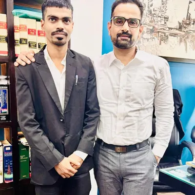A young lawyer visiting my office for the first time. It is my duty to set the right example and offer guidance to those beginning their legal journeys.