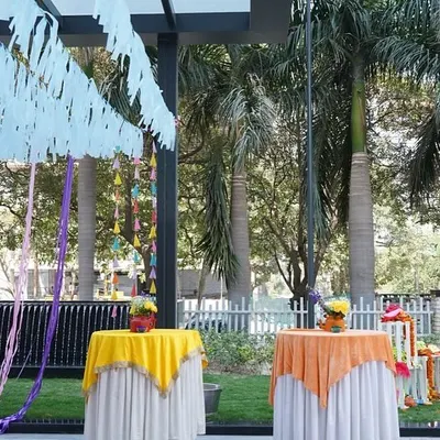 Bringing the festival of colors to the workplace. For this corporate Holi event, I set up brightly colored tablecloths and simple centerpieces to create a festive lunch area for employees.