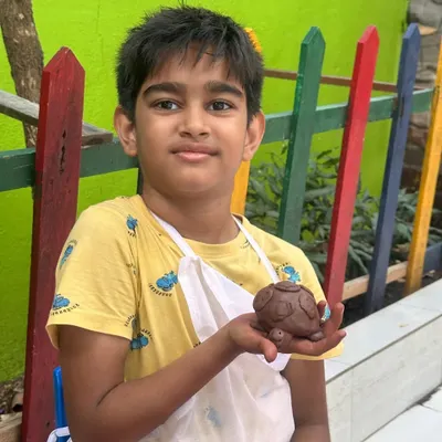 The pride in his eyes holding his little clay turtle is priceless. My workshops encourage kids to complete their projects, giving them a wonderful sense of accomplishment and a masterpiece to take home.