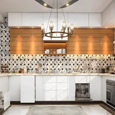 We designed this stunning U-shaped kitchen with a bold black-and-white patterned tile backsplash. The white handleless cabinets and drawers are contrasted with warm wood overhead units, and the space includes an integrated dishwasher and oven.