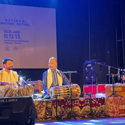 A dynamic percussion duet with Sukhad Munde on pakhawaj at the National Rhythm Festival in Kerala. The interplay between tabla and pakhawaj creates a powerful rhythmic tapestry.