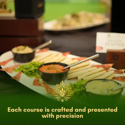 We also specialize in international flavors, such as this beautifully arranged Mezze Platter. It features freshly baked pita bread served with classic dips like hummus and muhammara, perfect for a modern, global touch at your event.