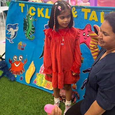 A quiet moment with the birthday girl after an "Under the Sea" themed show. I love connecting with each child and making them feel special on their big day.