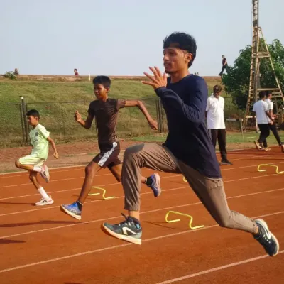 This action shot captures the intensity of our jump training workshop. Athletes work on explosive power and form, with every movement designed to improve their leap and performance.