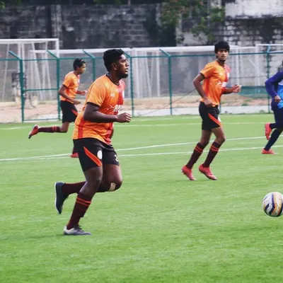 Players on the move during a training drill. Our sessions are designed to be high-intensity to simulate match conditions.