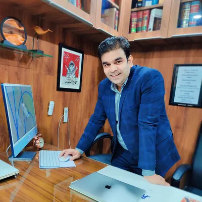 Advocate Varun Chaudhary in our firm's office. I am always available to discuss your case and provide clear, strategic legal advice.