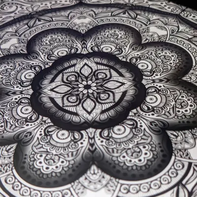 I have loved drawing patterns since I was young. This close-up of a mandala shows the intricate details and shading that bring me so much joy to create.