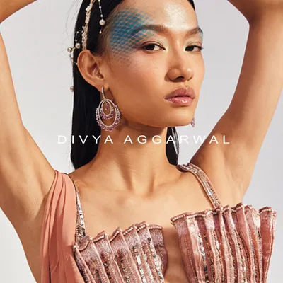A close-up of the shell-inspired 3D blouse from the Mira Saree Set, showcasing its unique pleated and embellished texture.