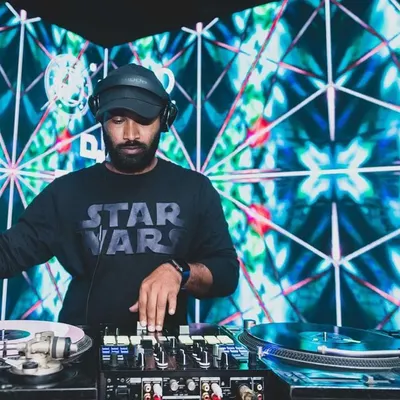 Mixing in front of a stunning visual display. I believe the right lighting and visuals are key to creating a fully immersive club experience, which I bring to every private and corporate event.