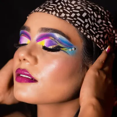 This vibrant Brazilian inspired look is a great example of the creative and colorful makeup I teach. Students learn to play with bold hues and graphic shapes to create true works of art.